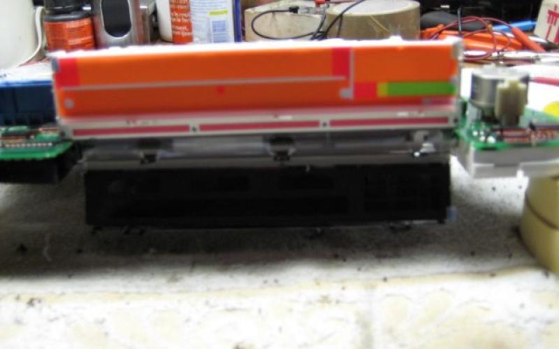 Optional: cardboard strips topside of the display.